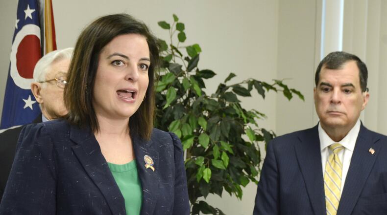 Rep. Brigid Kelly, D-Cincinnati, speaks in February 2020 about a bill to allow counties to test for fuel quality. She reintroduced a similar bill in February 2021 with Rep. Thomas Hall, R-Madison Twp., and Sen. George Lang, R-West Chester Twp., right, introduced an identical bill with Sen. Cecil Thomas, D-Cincinnati, in the Senate. Kelly and Lang, when both were in the Ohio House, introduced HB 499 in 2020 but it stalled. MICHAEL D. PITMAN/FILE