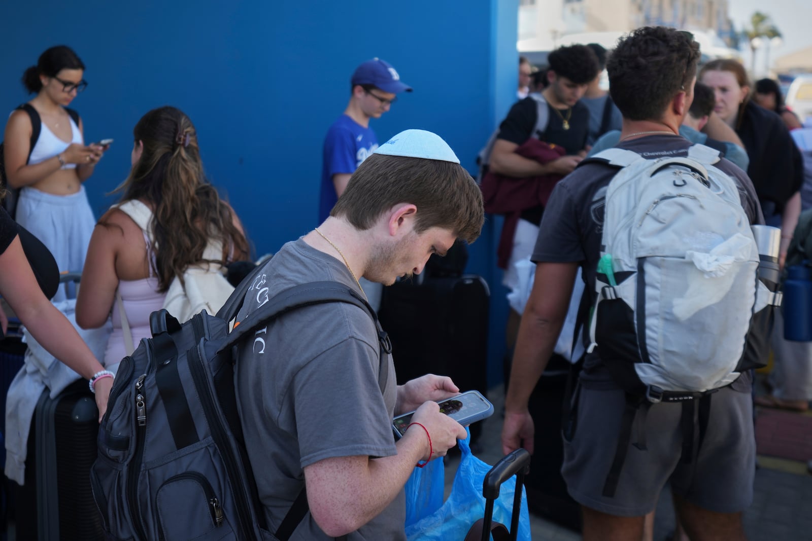 Evacuees from Israel arrive at the port of Larnaca, Cyprus, Wednesday, June 18, 2025. (AP Photo/Petros Karadjias)