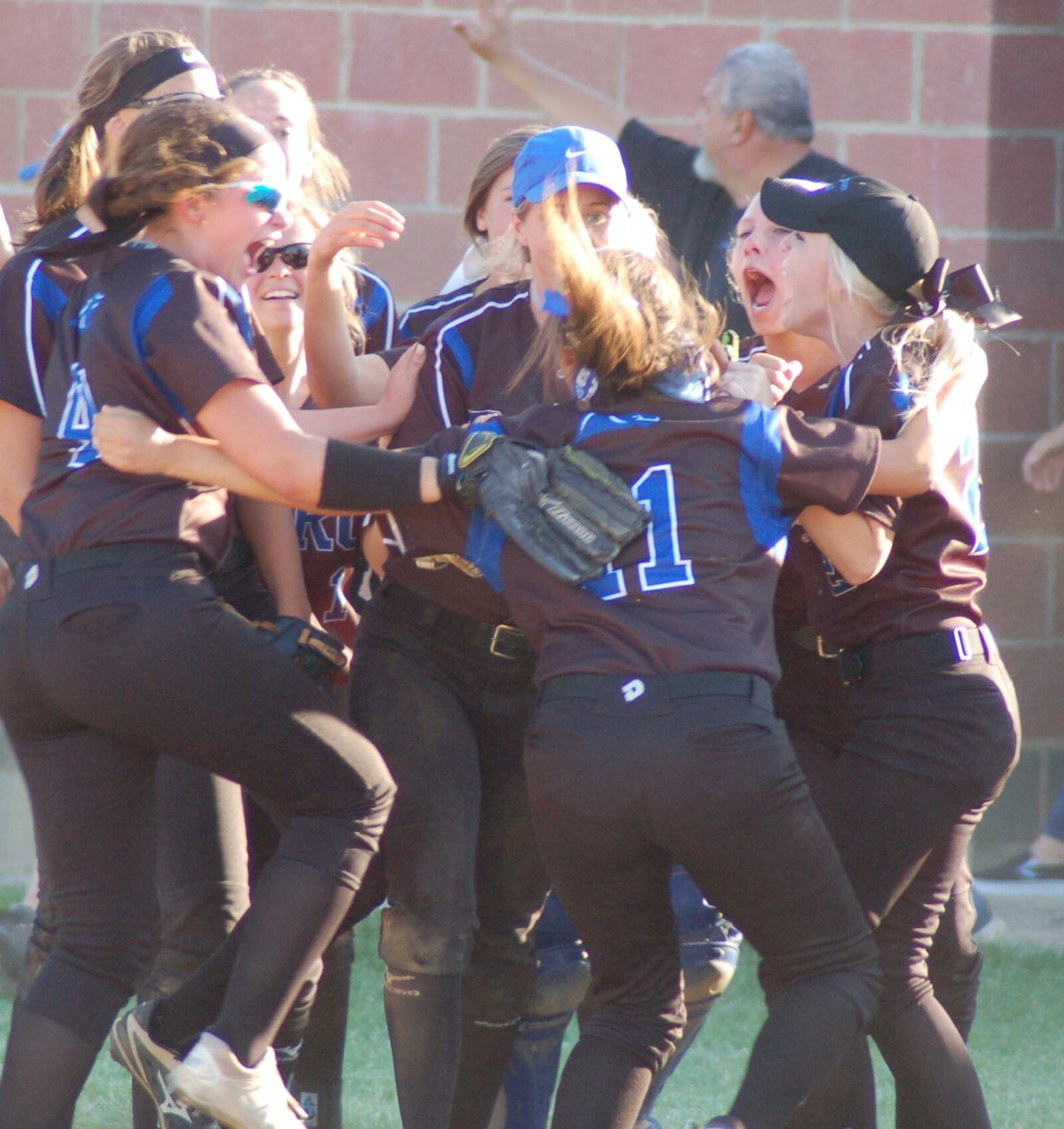 Springboro players celebrate their 8-6 victory over Lakota East in Division I sectional final Monday at West Carrollton. CONTRIBUTED PHOTO BY JOHN CUMMINGS