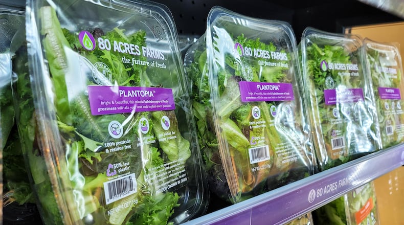 Hamilton-based 80 Acres Farms' produce is selling in a variety of area stores across the region. Coming in early 2022: Strawberriesrecently was certified insect free and Pareve by Central Kosher. Rabbi Lazer Fischer and Rabbi Avrohom Weinrib inspected the facility Friday, March 12 and performed tests to verify products were insect free. NICK GRAHAM / STAFF