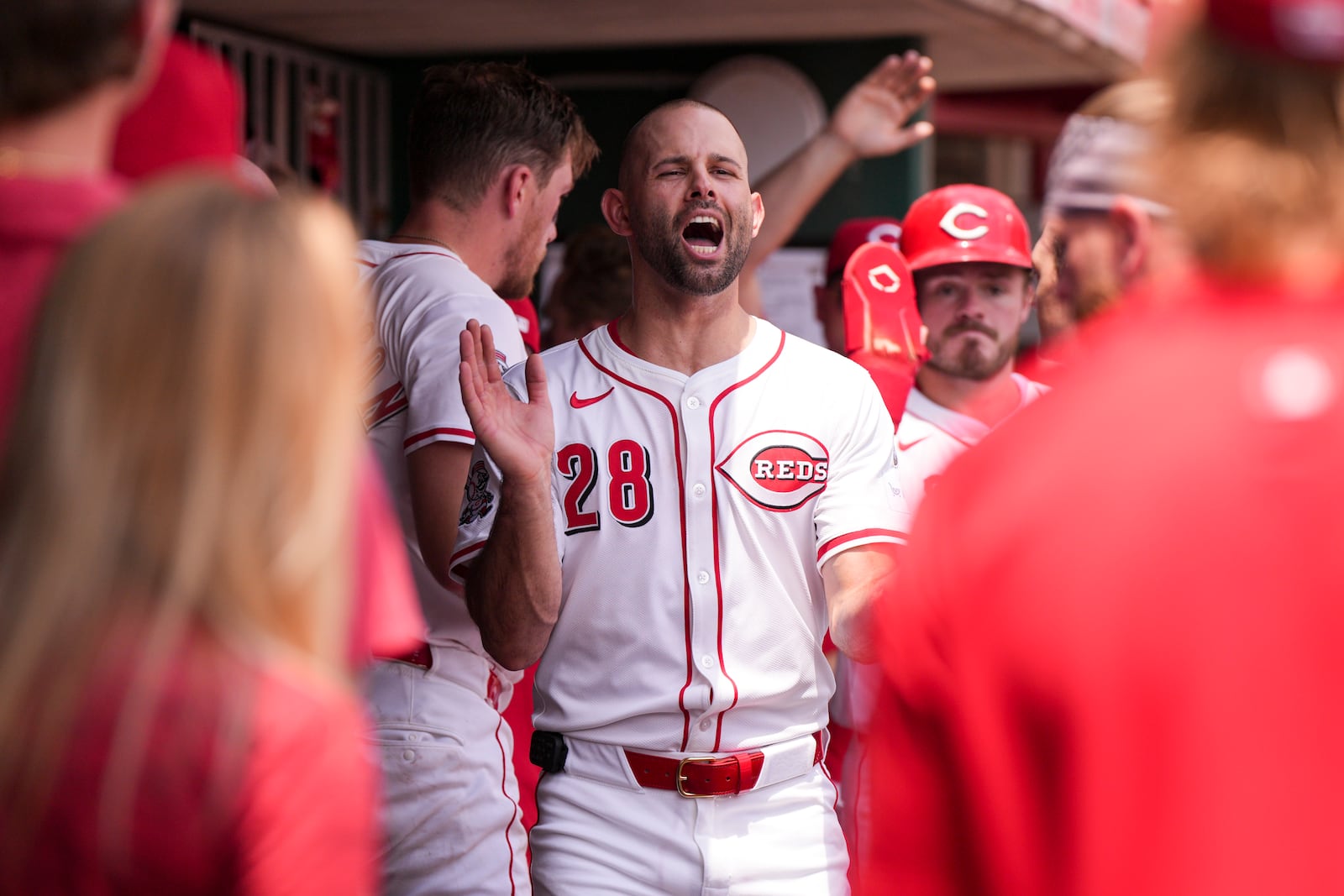 Cincinnati Reds' Nick Martinez (28) celebrates with teammates during the first inning of a baseball game against the Chicago White Sox, Thursday, May 15, 2025, in Cincinnati. (AP Photo/Jeff Dean)