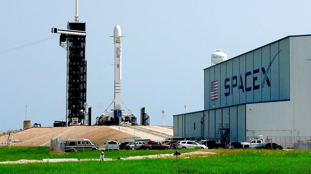FILE - A Falcon 9 SpaceX rocket stands ready for launch at pad 39A at the Kennedy Space Center in Cape Canaveral, Fla., Friday, June 26, 2020. (AP Photo/John Raoux, file)