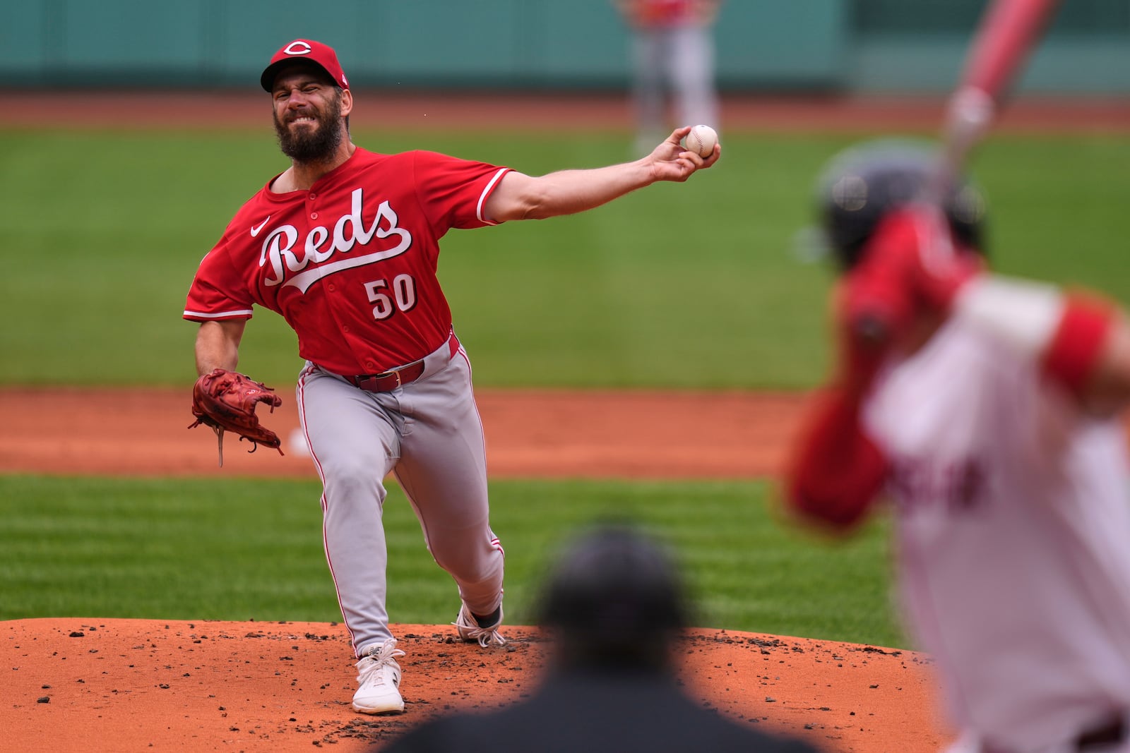 Cincinnati Reds pitcher Sam Moll delivers against the Boston Red Sox during the fourth inning of a baseball game, a continuation of a game the night before which was suspended due to rain, Wednesday, July 2, 2025, at Fenway Park, in Boston. (AP Photo/Charles Krupa)