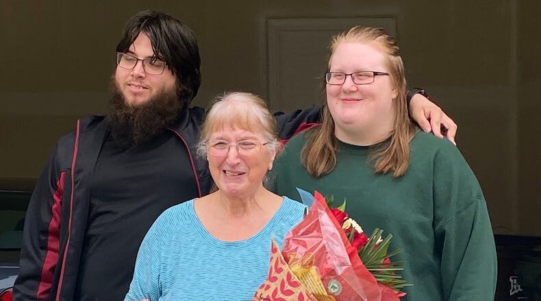 Publisher's Clearing House surprised Fairborn resident Margaret Allgood (front) with a $10,000 check on September 15. She is shown with (back row L-R) with nephew Jake Seaborn and his fiance, Cozette Guillory, who live with Allgood.