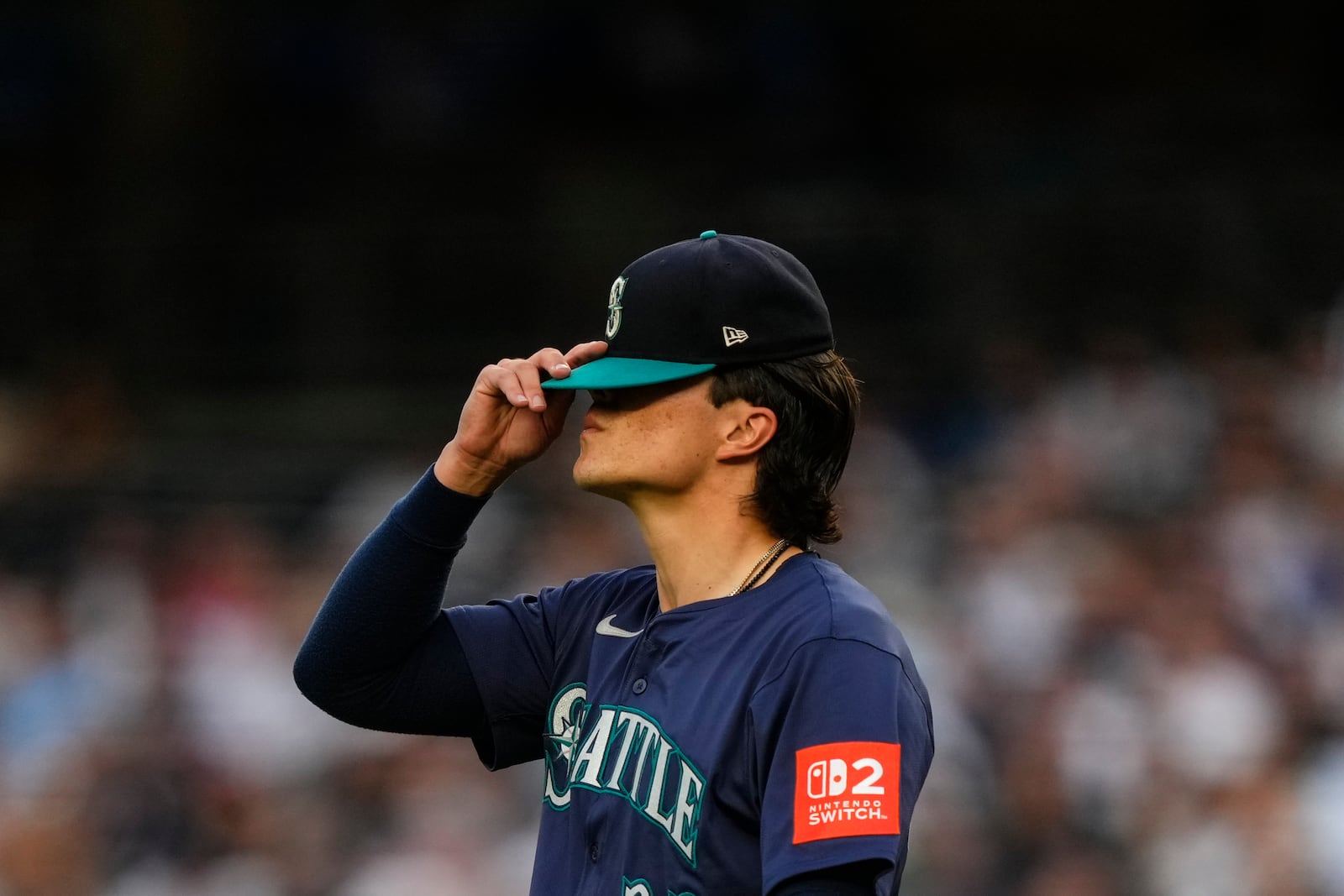 Seattle Mariners pitcher Bryan Woo (22) gets ready to pitch during the first inning of a baseball game against the New York Yankees, Thursday, July 10, 2025, in New York. (AP Photo/Yuki Iwamura)