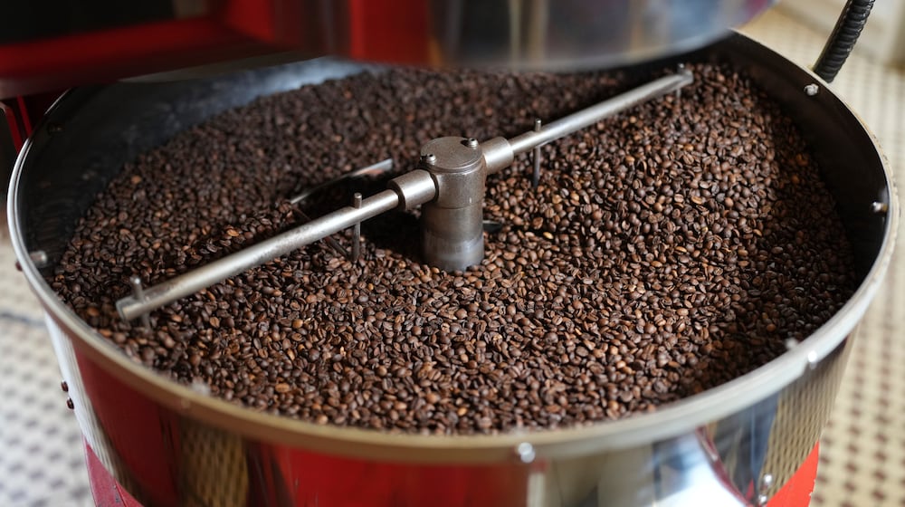 FILE - Coffee beans are prepared at a farm in Braganca Paulista, Brazil, Monday, Aug. 4, 2025. (AP Photo/Andre Penner, File)