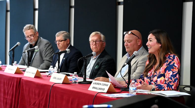 Five people are seeking three open seats on Hamilton City Council in the Nov. 4 general election. Candidates participated in a candidates' forum hosted by the Greater Chamber of Commerce, on Sept. 24 at Miami Downtown Hamilton Center on High Street. MICHAEL D. PITMAN / STAFF