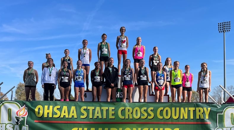 Lakota West junior Evelyn Prodoehl stands atop the podium Saturday as the Division I girls state cross country champion. OHSAA photo
