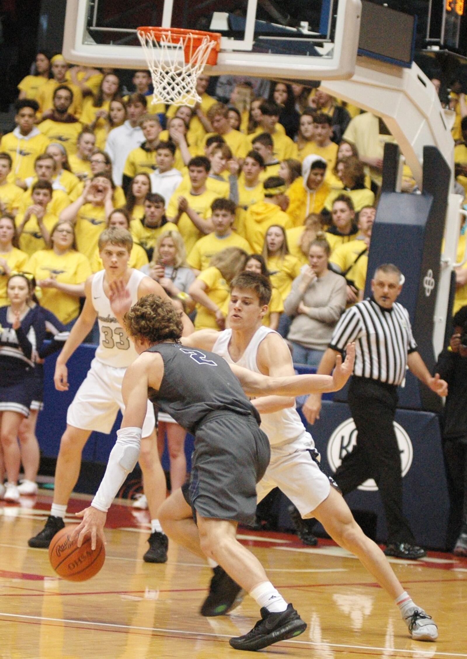 Lakota East’s Will Johnston defends Fairmont’s Kellan Bochenek during last Saturday’s Division I district basketball final at the University of Dayton Arena. East won 50-36. RICK CASSANO/STAFF