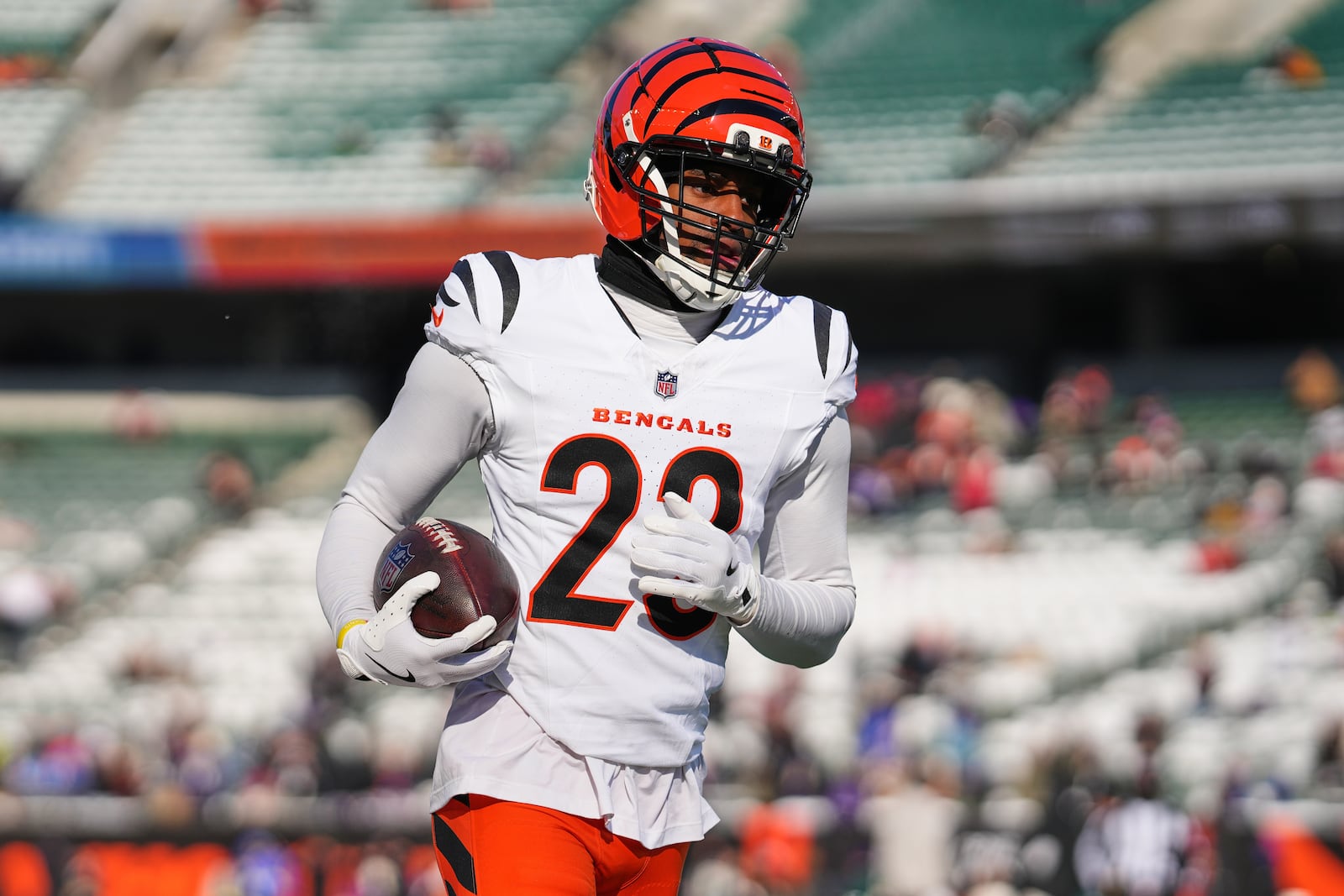 Cincinnati Bengals cornerback Dax Hill (23) warms up before an NFL football game against the Baltimore Ravens, Sunday, Dec. 14, 2025, in Cincinnati. (AP Photo/Jeff Dean)
