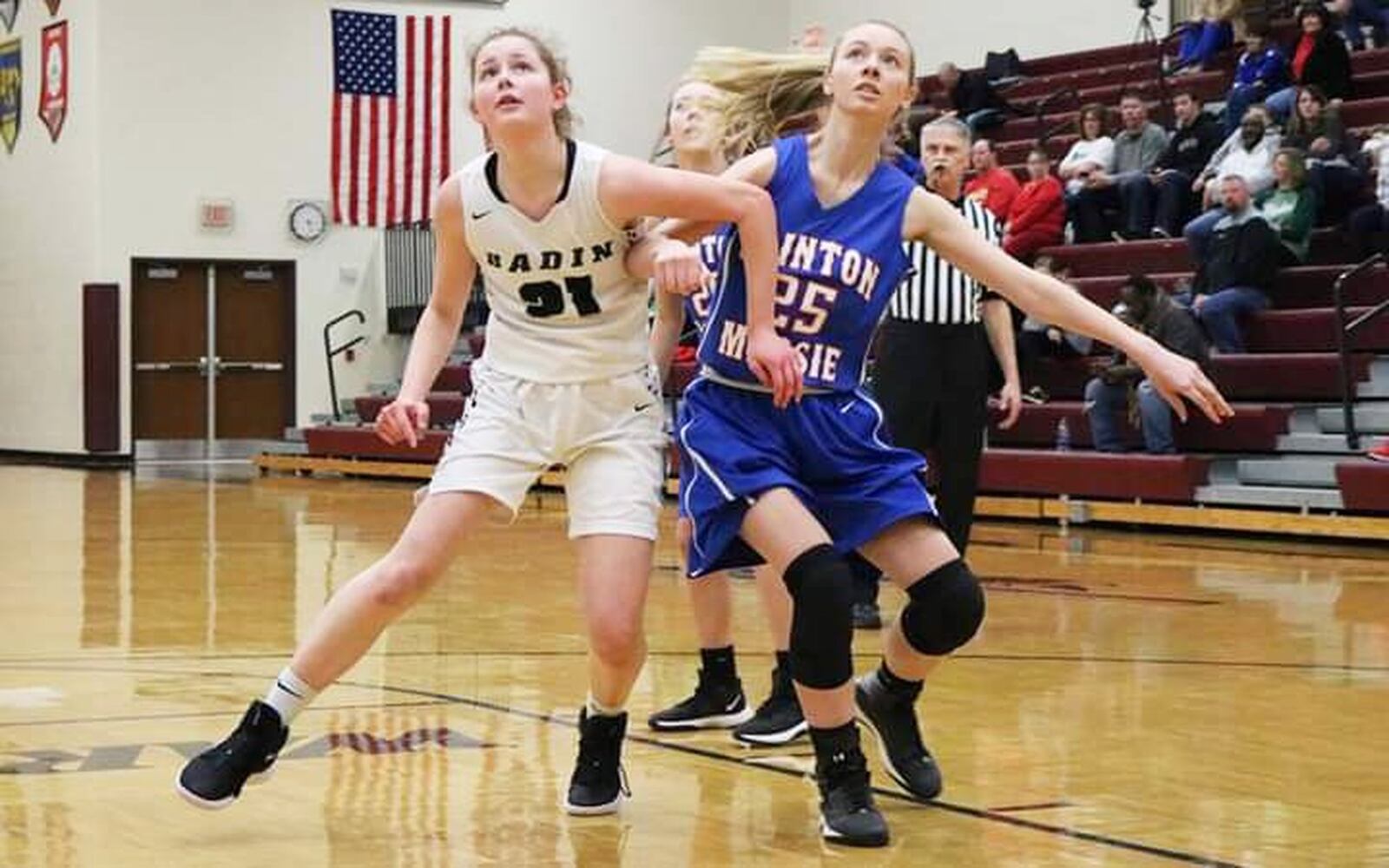 Badin’s Maddie Thompson (21) tries to get position against Clinton-Massie’s Avery Cranmer (25) during Saturday afternoon’s Division II sectional opener at Lebanon. Badin won 54-10. CONTRIBUTED PHOTO BY TERRI ADAMS