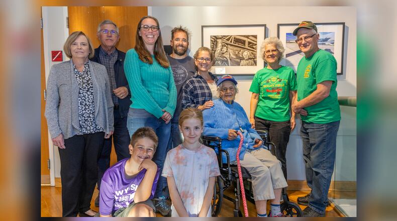 Grace Hogan pictured with family at the Fitton Center gallery opening of "We > Me: 17 Artists Explore Hamilton Neighborhoods" on Oct. 19.