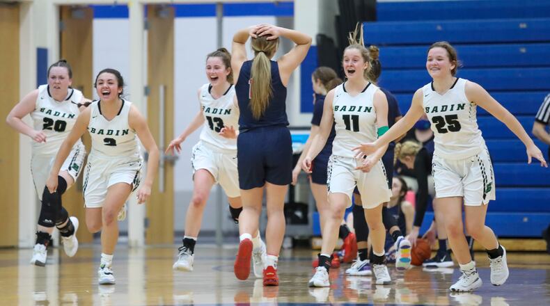 Members of Badin High School girls basketball team celebrates moments after beating Columbus Bishop Hartley 50-49 in a Division II regional semifinal game on Tuesday, March 2, 2021 at Springfield High School. Michael Cooper/CONTRIBUTED