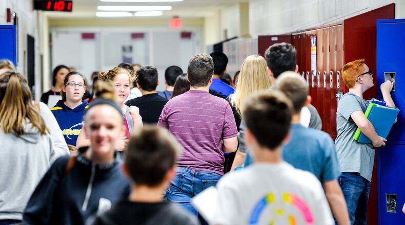 Students change classes in the junior high section of Monroe Junior/Senior High School Tuesday, Oct. 17. Monroe’s school board could decide to move on a new school tax hike and building plan next year as a way to go to handle the district’s growing enrollment. NICK GRAHAM/STAFF