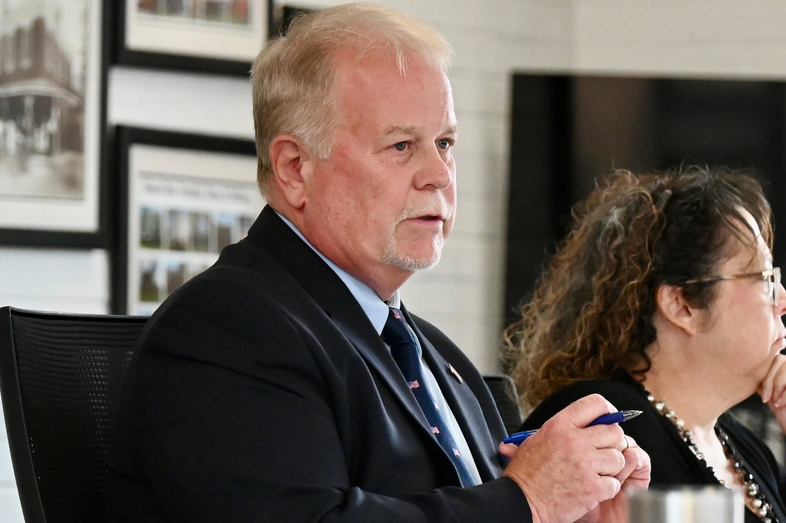For the second consecutive meeting, Ross Twp. residents on Aug. 7, 2025, showed up calling for Trustee David Young to resign following racist comments he made on a Facebook post following the Cincinnati brawl in late July. Trustees called a special meeting on July 31, 2025, to address the comments and the fallout. Young apologized but refused to resign after being asked by residents and fellow trustees. He's seeking another term as trustee in this fall's election. Pictured is Ross Twp. Trustee Russ McGurrin addressing his feelings towards Young's comments on Aug. 7, 2025. MICHAEL PITMAN/STAFF