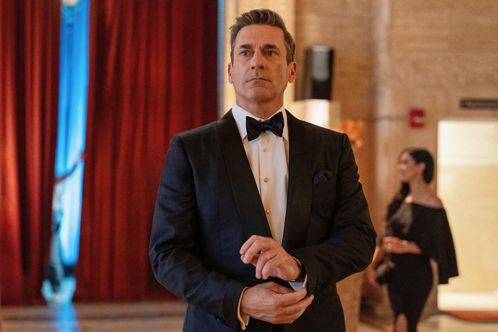 This image released by Apple TV+ shows Jon Hamm in a scene from "Your Friends & Neighbors." (Jessica Kourkounis/Apple TV+ via AP)