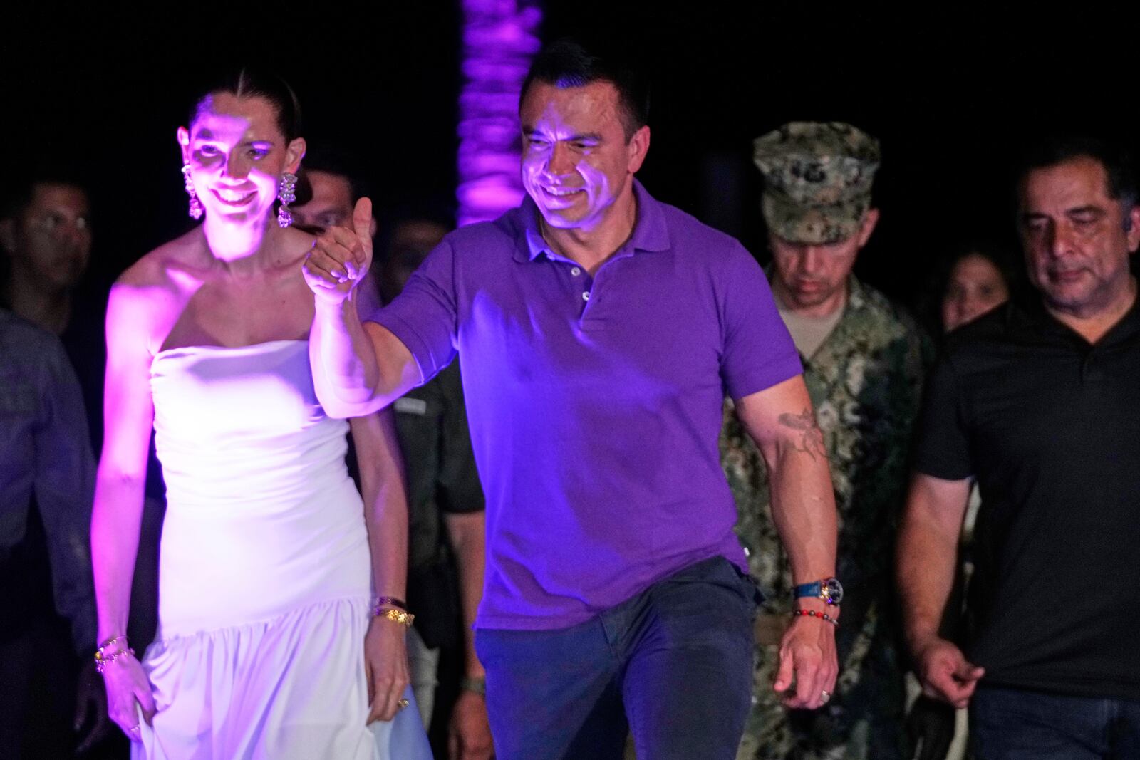 Ecuador's President Daniel Noboa arrives with his wife Lavinia Valbonesi to address supporters after early returns show him in the lead in the presidential election runoff at his family home in Olon, Ecuador, Sunday, April 13, 2025. (AP Photo/Fernando Vergara)