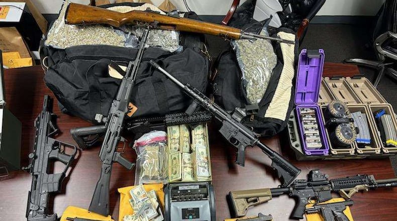 Three were arrested and marijuana, cash, guns and cares were seized Wednesday from a West Chester Twp. residence. BUTLER COUNTY SHERIFF'S OFFICE