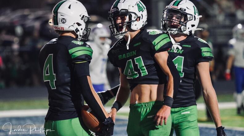 Badin receiver Declan Brown (4) celebrates with teammates Sam Von Hagen (41) and Hudson Heid (4) during their game against Carroll earlier this season. Jordan Phillips/CONTRIBUTED
