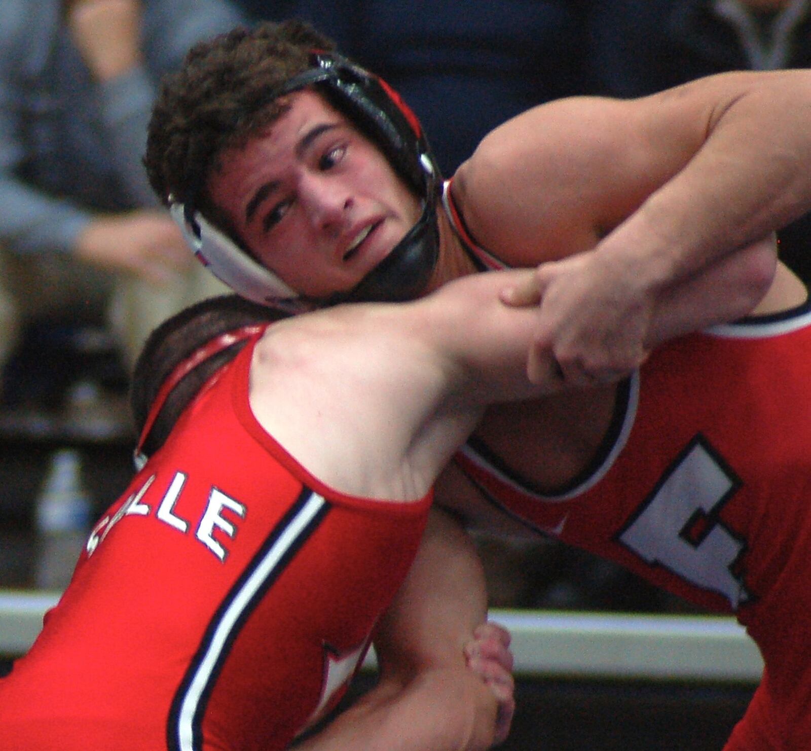 Fairfield’s Zach Shupp (right) looks for an opening to attack La Salle’s Lucas Byrd during their 106-pound title match in the Division I district tournament at Fairmont’s Trent Arena on Saturday. Byrd emerged with a 2-1 victory. CONTRIBUTED PHOTO BY JOHN CUMMINGS