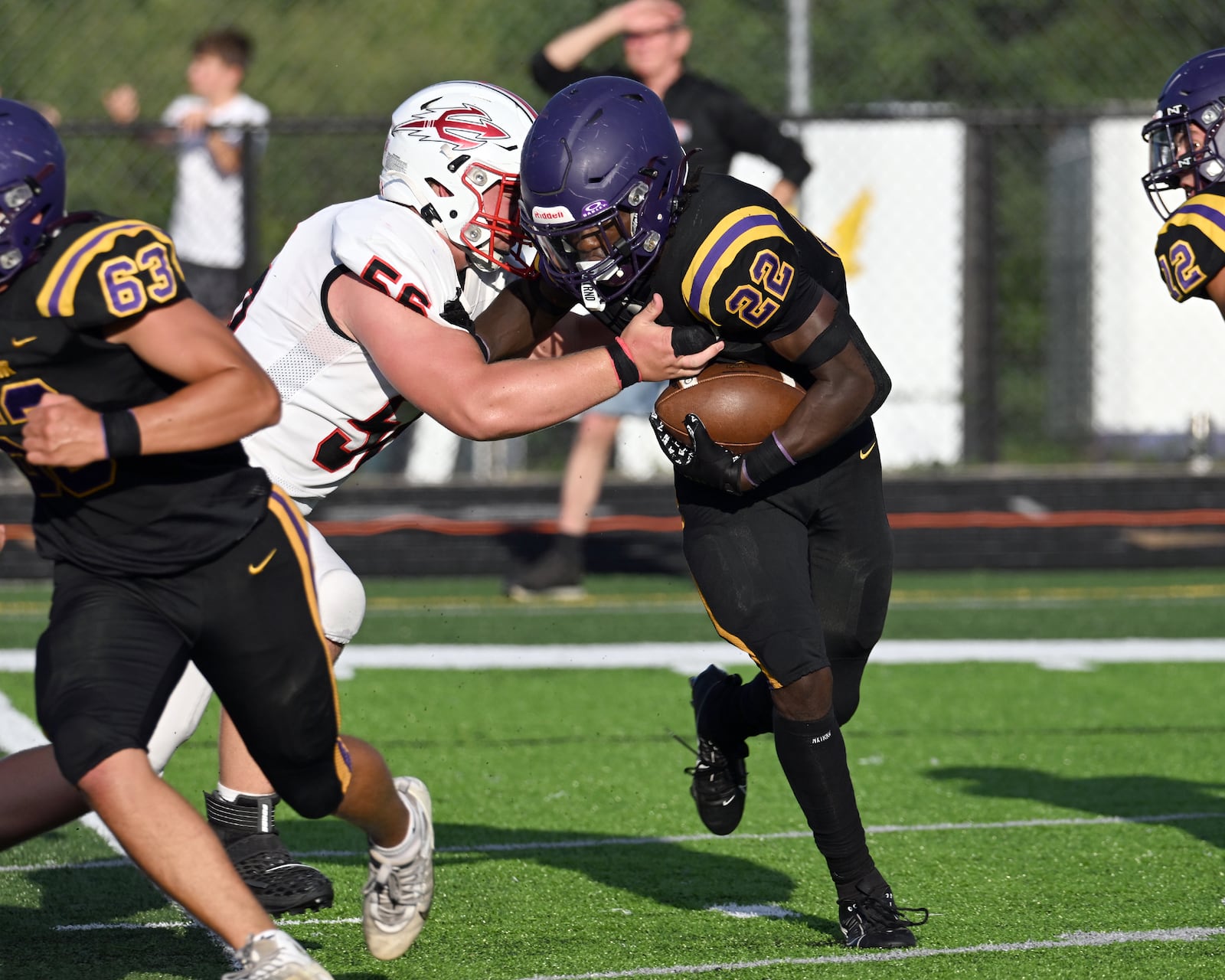 Bellbrook senior Gage Cameron is tackled by Tippecanoe junior Ryan Kolb during their game on Friday, Aug. 22 at Miami Valley South Stadium. The Red Devils won 21-0. NICK FALZERANO / CONTRIBUTED PHOTO