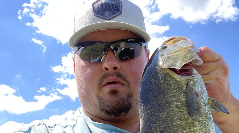 Aaron Huber of Dayton won two of three categories in the first-ever Great Smallmouth Bass Fishing Challenge on the Great Miami River. PROVIDED