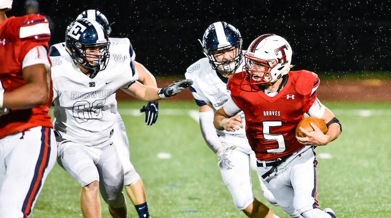 Talawanda quarterback Tyler Teeters runs the football during their game against Edgewood Friday, Oct. 12 at Talawanda High School in Oxford. Edgewood won 54-0. NICK GRAHAM/STAFF