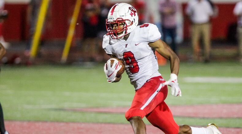 Fairfield’s Jutahn McClain carries the ball for a touchdown during their football game against Lakota West Friday, Sept. 27, 2019 at Lakota West High School in West Chester Township. Fairfield defeated Lakota West 33-7. NICK GRAHAM/STAFF