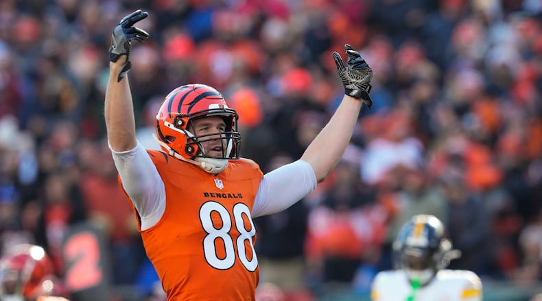 Cincinnati Bengals tight end Mike Gesicki reacts after a catch during the first half of an NFL football game against the Pittsburgh Steelers, Sunday, Dec. 1, 2024, in Cincinnati. (AP Photo/Jeff Dean)