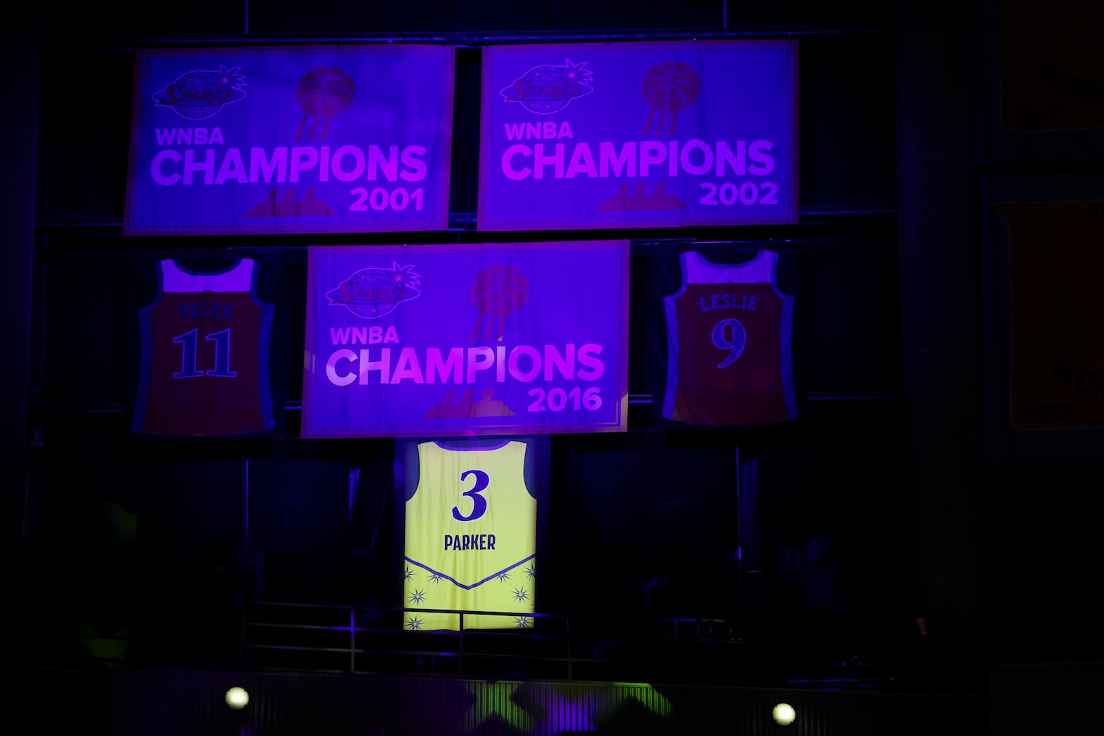The jersey of former Los Angeles Sparks player Candace Parker is displayed during her jersey retirement ceremony at a WNBA basketball game between the Sparks and the Chicago Sky, Sunday, June 29, 2025, in Los Angeles. (AP Photo/Jessie Alcheh)