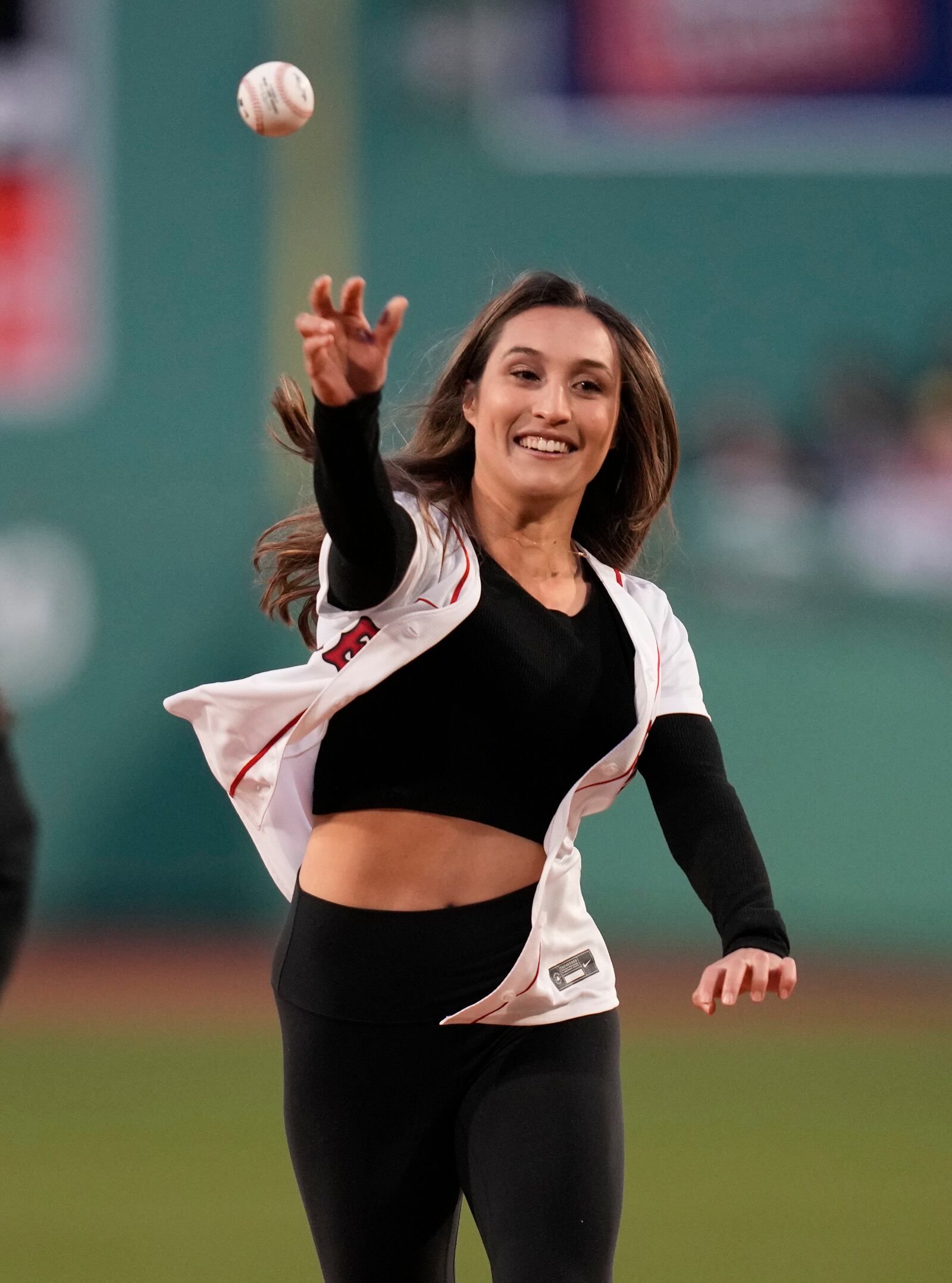 FILE - MIT women's soccer graduate student Karenna Groff throws a ball prior to a baseball game at Fenway Park, Monday, April 3, 2023, in Boston. (AP Photo/Charles Krupa, File)