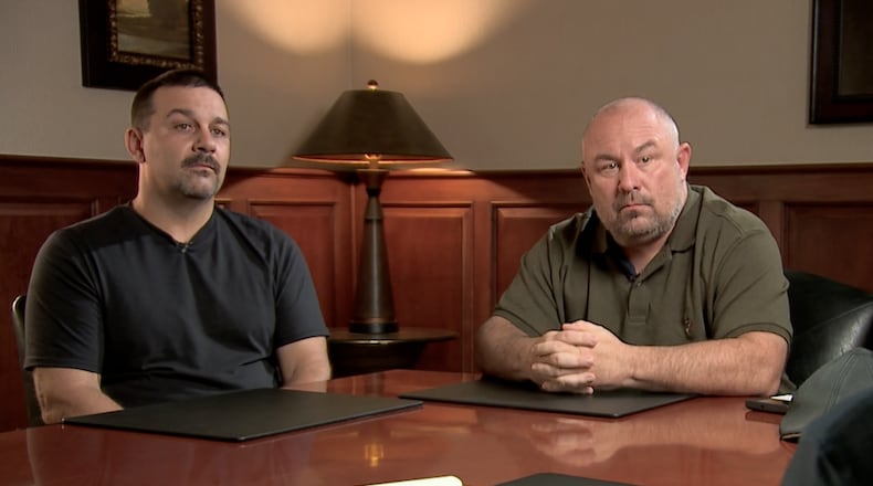 Wilmington residents Darrell Petrey and Tony Thomas were awarded $300K after being thrown out of a city council meeting and arrested. RAY PFIFFER/WCPO