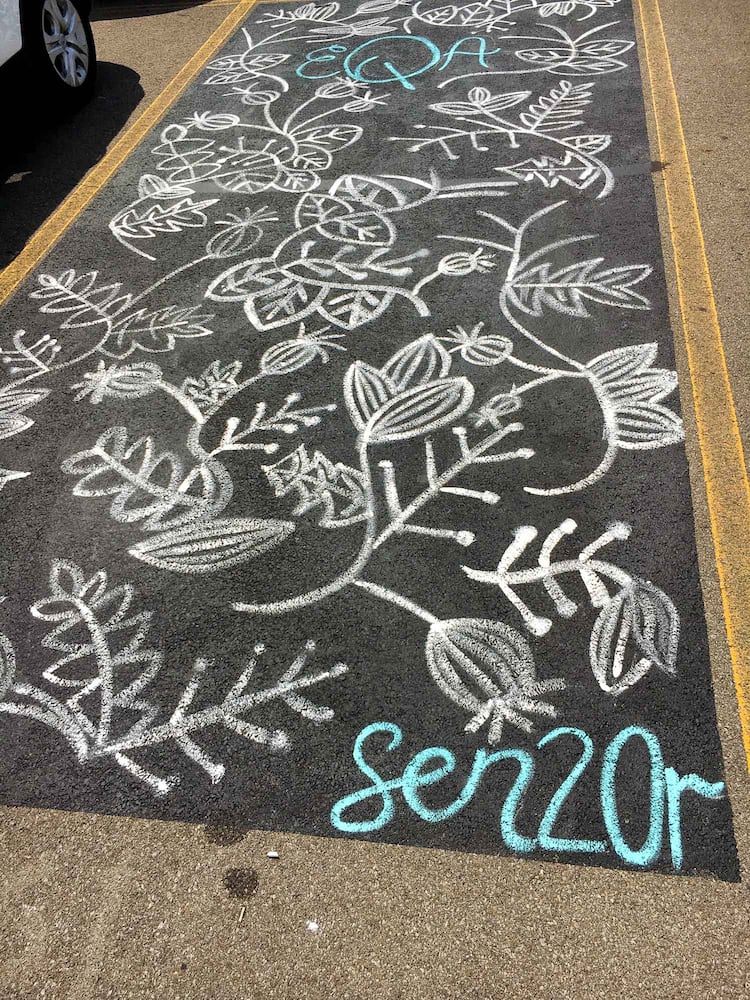 PHOTOS Lakota East seniors paint parking spots