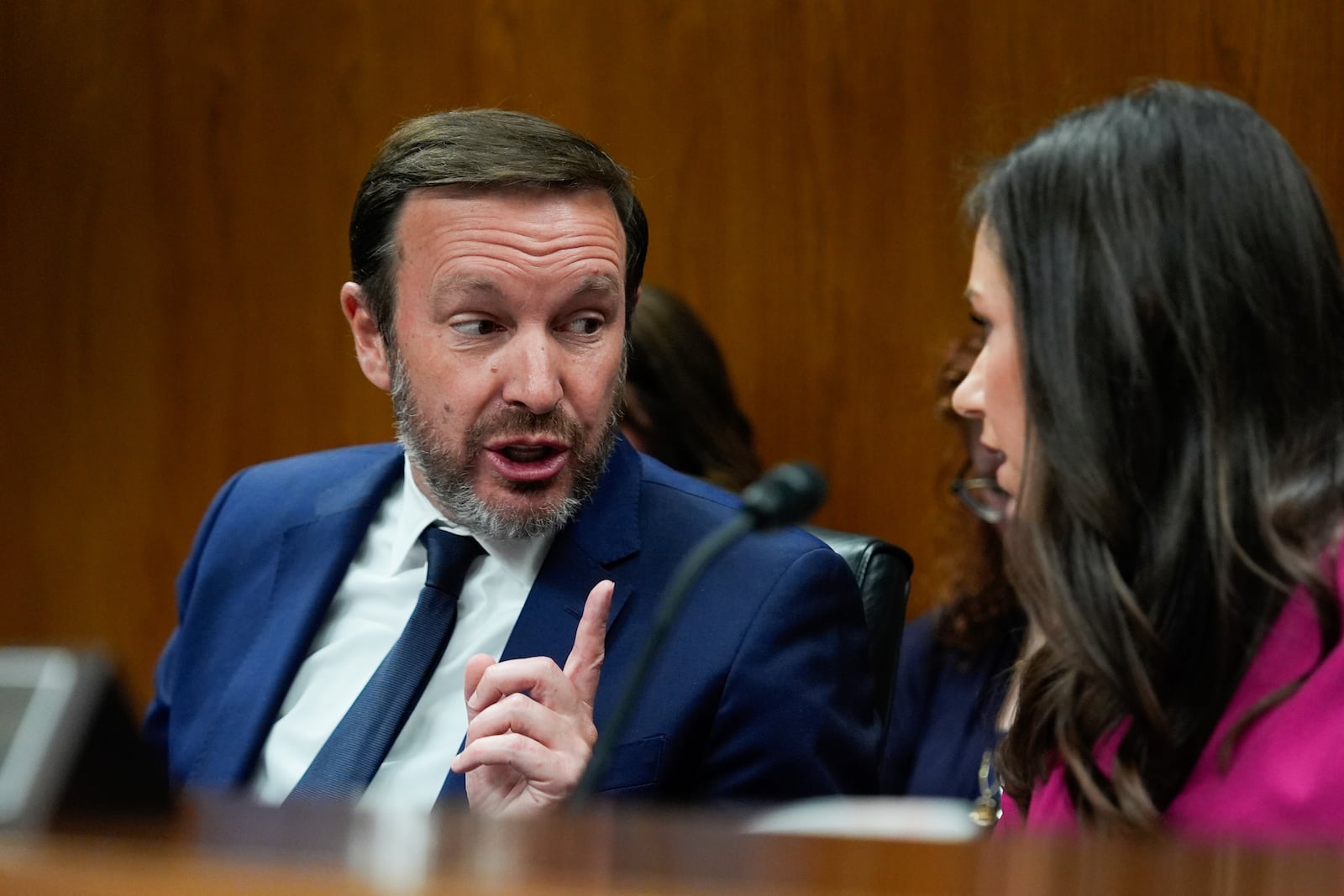 Sen. Chris Murphy, D-Conn., speaks, left, with Sen. Katie Britt, R-Ala., during a Senate Appropriations Subcommittee on Homeland Security oversight hearing, Thursday, May 8, 2025, on Capitol Hill in Washington. (AP Photo/Julia Demaree Nikhinson)