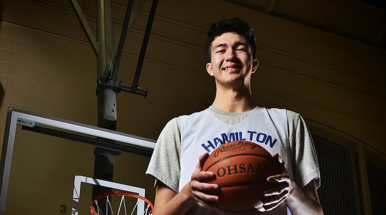 Sage Tolentino, a 210-pound, 7-foot junior from Hawaii is playing basketball for Hamilton High School this season. Tolentino ended up in Hamilton after sports in Hawaii were cancelled due to the coronavirus. He has verbally committed to play college basketball for Bruce Pearl at Auburn University. NICK GRAHAM / STAFF
