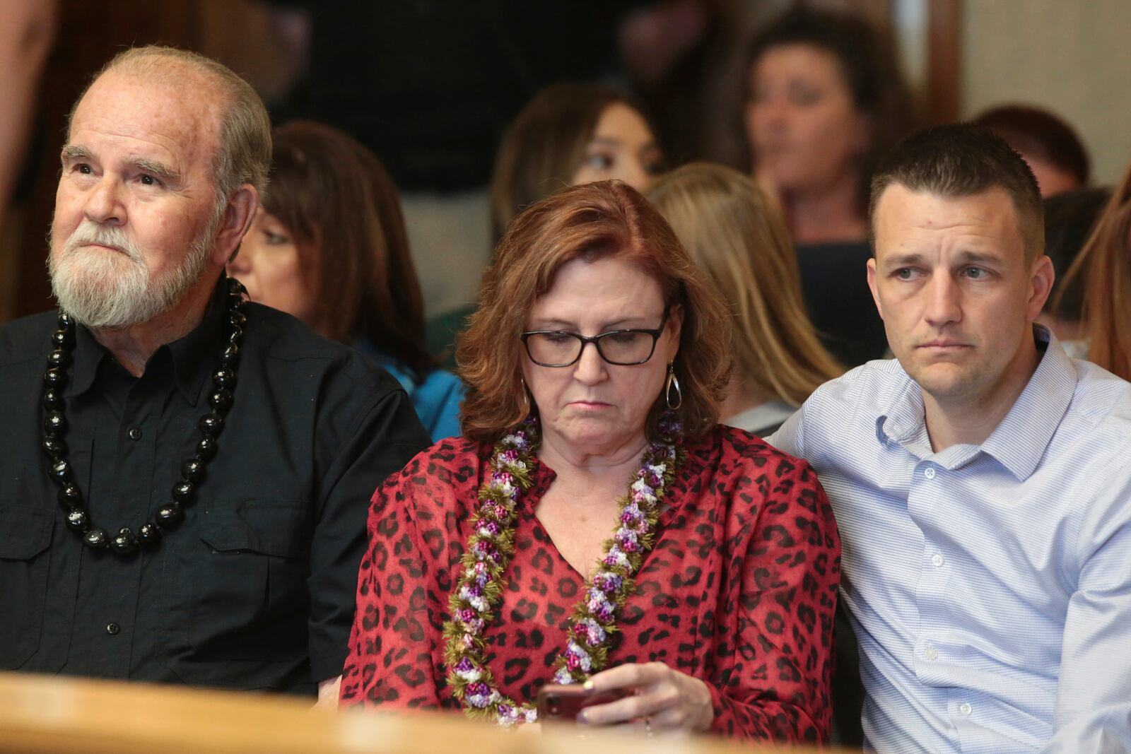 FILE - Larry Woodcock, from left, Kay Woodcock and Brandon Boudreaux attend the hearing for Lori Vallow Daybell on Friday, March 6, 2020, in Rexburg, Idaho. Daybell who is charged with felony child abandonment after her two children went missing nearly six months ago had her bond reduced to $1 million by an Idaho judge on Friday. (John Roark/The Idaho Post-Register via AP, Pool, File)