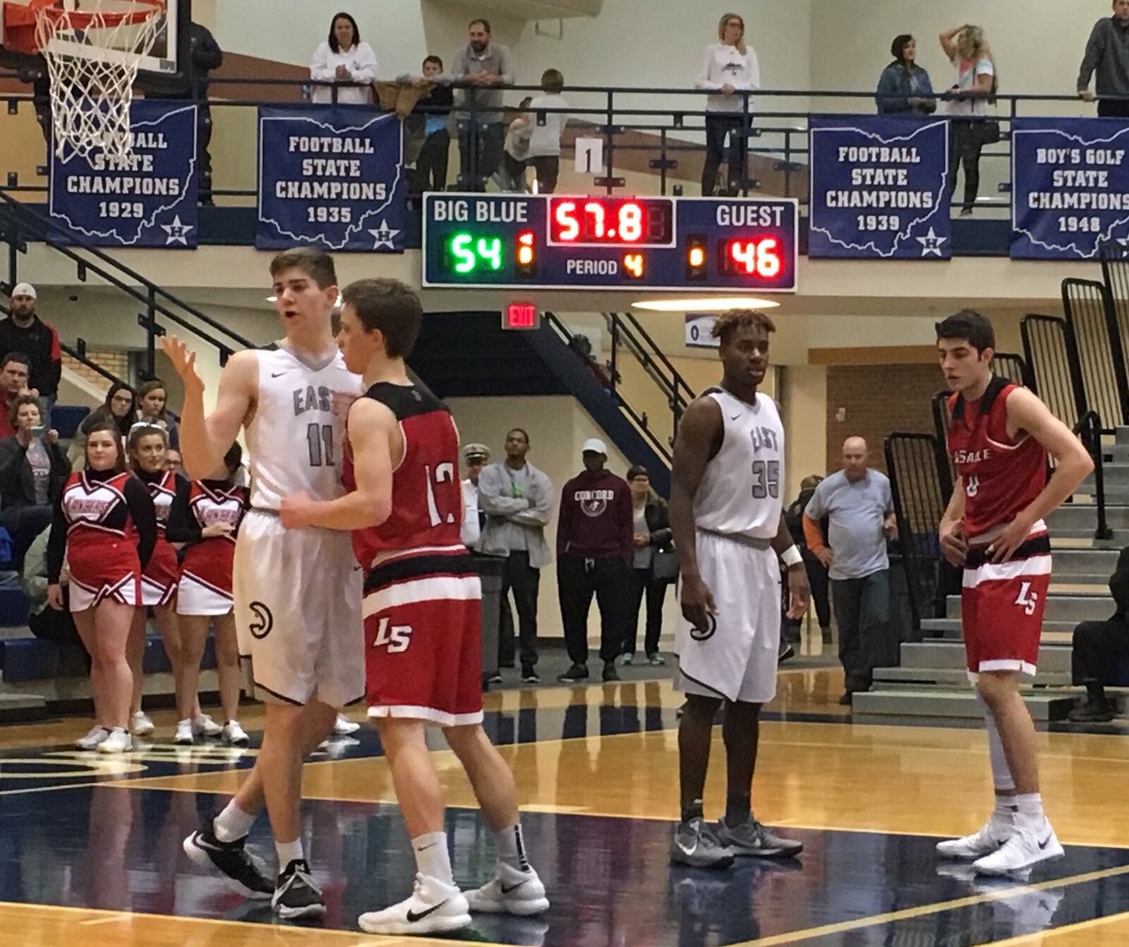 Lakota East’s Alex Mangold (11) and Jarrett Cox (35) prepare for an inbounds play against La Salle’s Henry Louden (12) and Kodyn Lambert (right) during Friday night’s Division I sectional final at the Hamilton Athletic Center. RICK CASSANO/STAFF