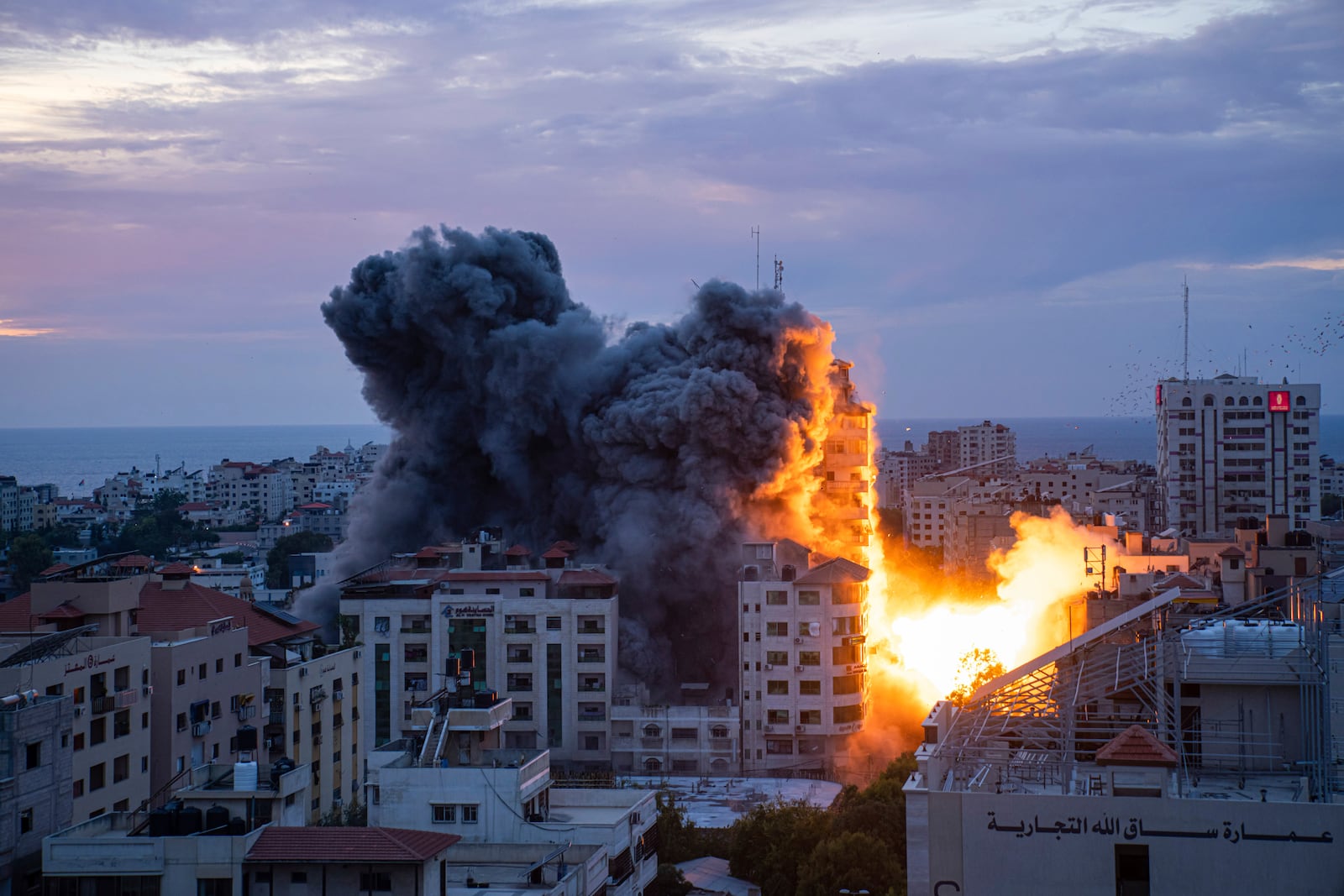 FILE - Fire and smoke rise following an Israeli airstrike in Gaza City, Oct. 7, 2023. (AP Photo/Fatima Shbair, File)