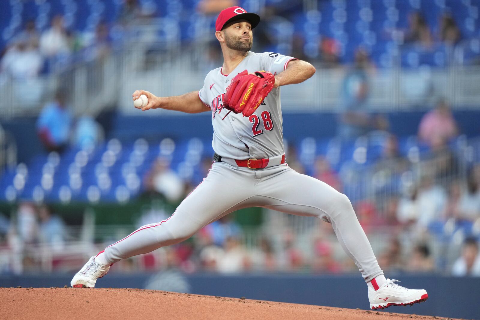 Cincinnati Reds starting pitcher Nick Martinez throws during the first inning of a baseball game against the Miami Marlins, Tuesday, April 22, 2025, in Miami. (AP Photo/Lynne Sladky)
