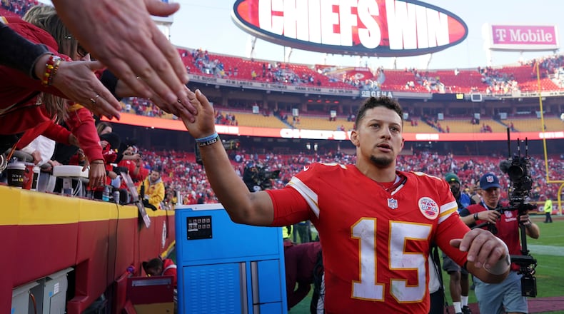 Kansas City Chiefs quarterback Patrick Mahomes (15) greets fans following an NFL football game against the Indianapolis Colts Sunday, Nov. 23, 2025, in Kansas City, Mo. (AP Photo/Ed Zurga)