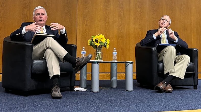 Former Ohio Gov. Bob Taft (right) and former state Rep. Mike Curtin (left) participate in a June forum hosted by the Dayton League of Women Voters centered on the Aug. 8 special election for Issue 1. AVERY KREEMER/STAFF
