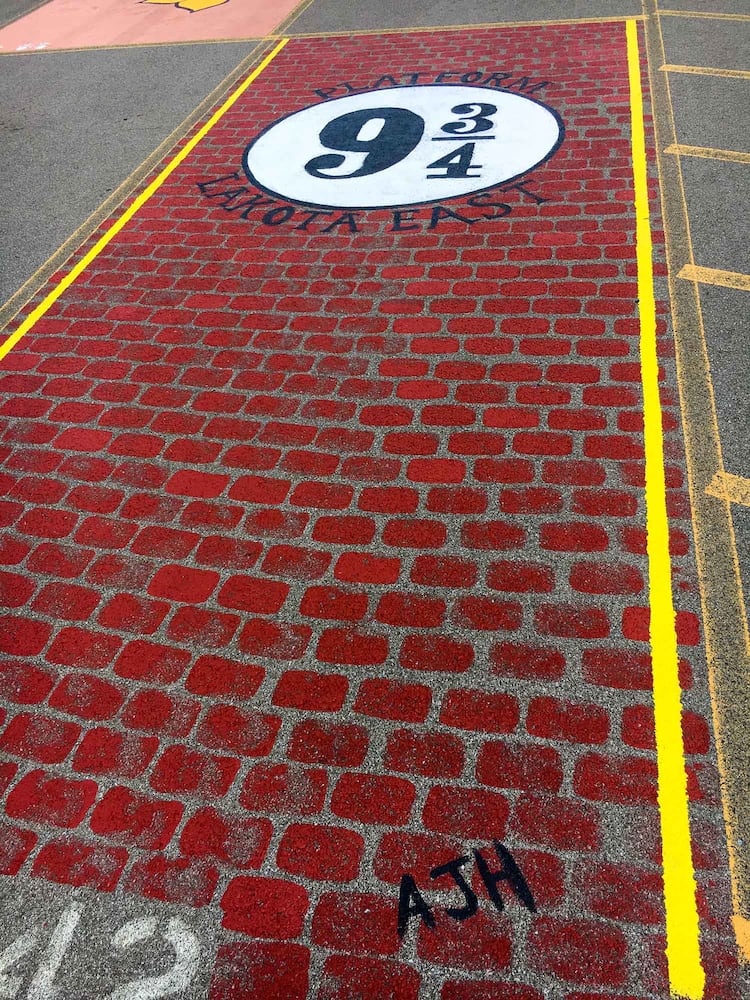 PHOTOS Lakota East seniors paint parking spots