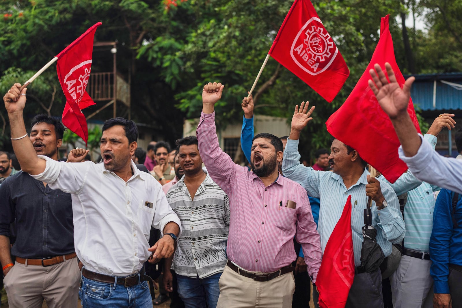 Bank employees shout slogans against privatization of public sector banks during a country-wide strike in Mumbai, India, , Wednesday, July 9, 2025. (AP Photo/ Rafiq Maqbool)
