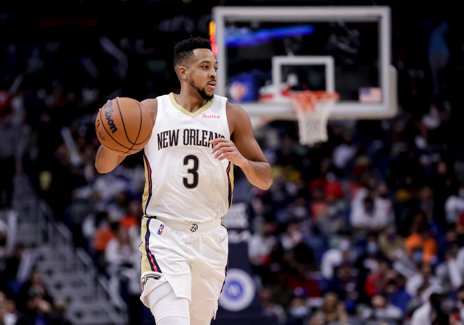 FILE - New Orleans Pelicans guard CJ McCollum (3) plays against the Miami Heat in the second half of an NBA basketball game in New Orleans, Feb. 10, 2022. (AP Photo/Derick Hingle, File)