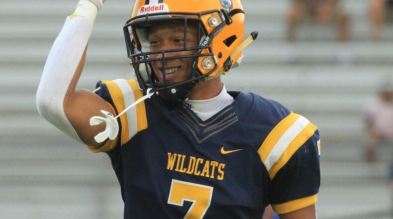 Springfield's Anthony Brown celebrates after a touchdown catch in the first quarter against Saint Ignatius on Friday Aug. 20, 2021, at Springfield High School. David Jablonski/Staff