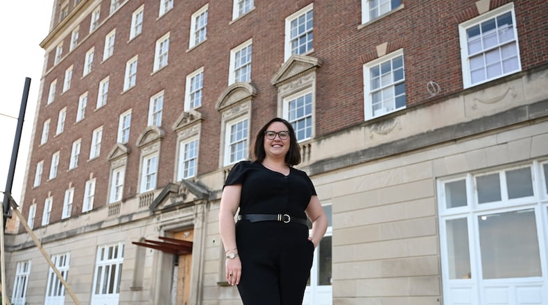 Lighthouse Hospitality Group recently announced that Catherine Rentschler is the new Managing Director of The Well House Hotel, a Tapestry Collection by Hilton. Her responsibilities include leading the day-to-day operations and sales efforts for the 54-room hotel on South Monument Avenue in downtown Hamilton, Ohio. Pictured is Rentschler in front of the hotel that is expected to be ready for opening by November 2024. MICHAEL D. PITMAN/STAFF