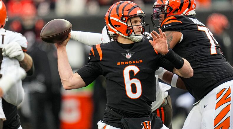 Cincinnati Bengals quarterback Jake Browning (6) thorws against the Cleveland Browns in the second half of an NFL football game in Cincinnati, Sunday, Jan. 7, 2024. (AP Photo/Sue Ogrocki)