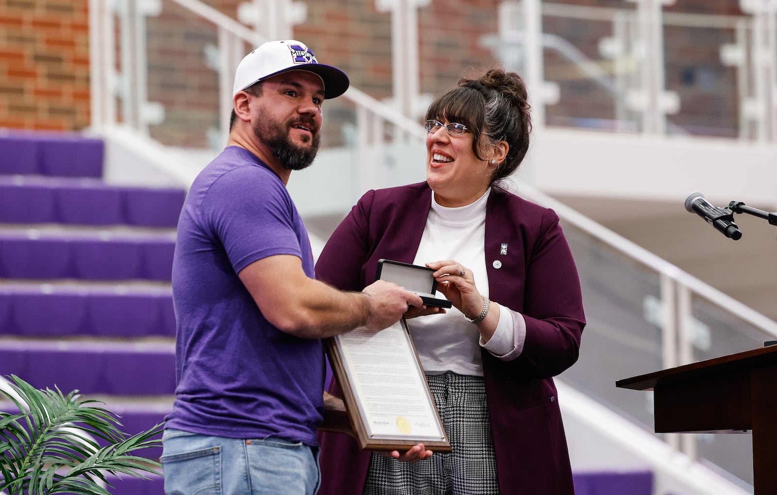 Middletown native and Major League Baseball player Kyle Schwarber returned to Middletown High School for an event at Wade E. Miller Arena Wednesday, Nov. 19, 2025. The “Beyond the Field with Kyle Schwarber” night gave a crowd of baseball fans a chance to here Scwarber talk about baseball, family and giving back to the community during the event. Mayor Elizabeth Slamka presented Schwarber with a key to the city. NICK GRAHAM/STAFF