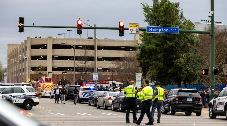 Emergency officials gather outside Old Dominion University's campus after reports of an active shooter on Thursday, March 12, 2026 in Norfolk, Va. (Kendall Warner/The Virginian-Pilot via AP)