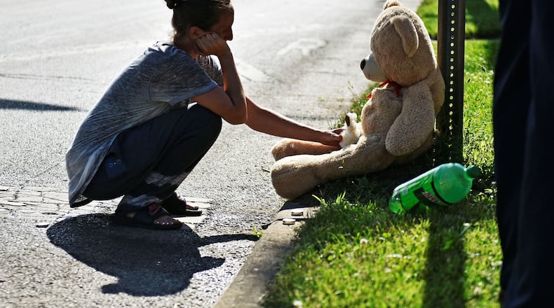 Joseph Davis, 17, died in a shooting Tuesday night at Woodlawn Avenue and Garfield Street. A memorial was erected Wednesday morning at the site of the shooting.